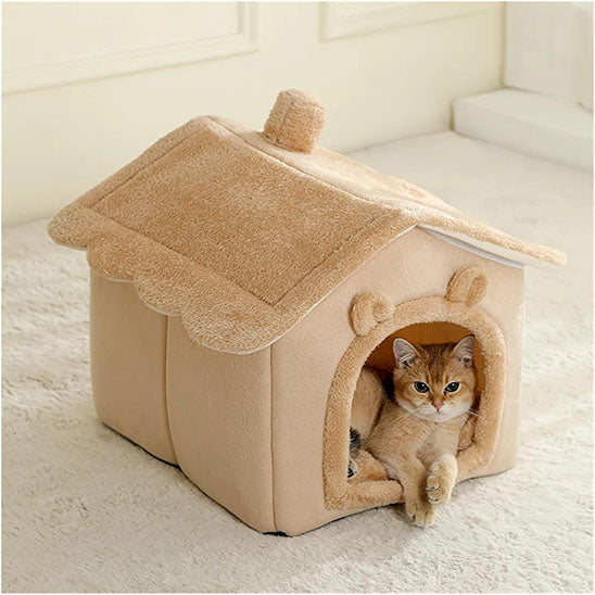 niche pour chat beige avec chat dedans